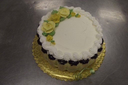 Tiramisu plain top with flowers.